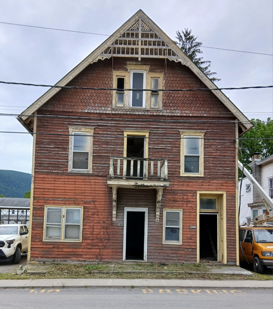 M'burgh Village OK Sidewalk Bid